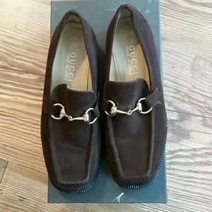 Brown Gucci loafers